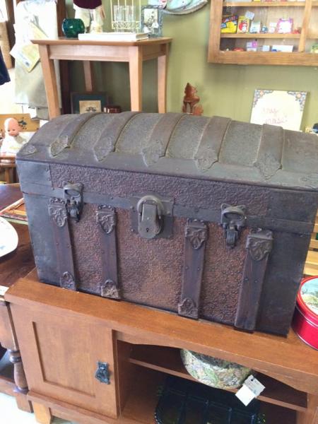 This unique antique chest would be perfect for adding a piece of history to your living room. 