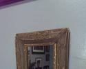 Take a look at this intricate gold mirror! 